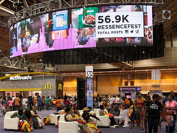 A data visualization showing post trends running on a huge LED screen at the New Orleans Convention Center